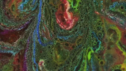Glitter paint water fluid bubbles green ink mix Video stock 274518317