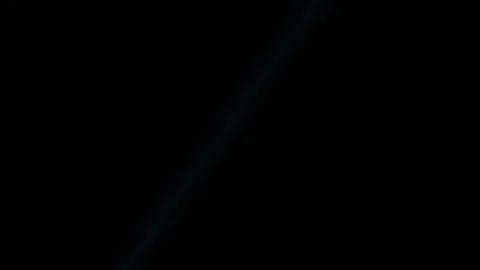Glitter particles dissolving into darkness creates a Stock Footage 342388513