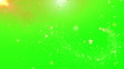 Glitter particles fall against green screen with spotlight Video stock 336591177