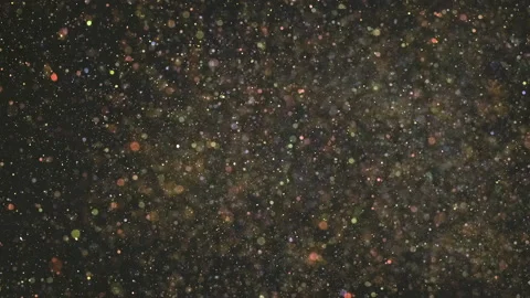 The glitter particles floating on the black background. slow motion Stock Footage 160066428