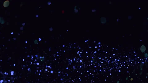 Glitter Particles Floating with Bokeh Ef... | Stock Video | Pond5