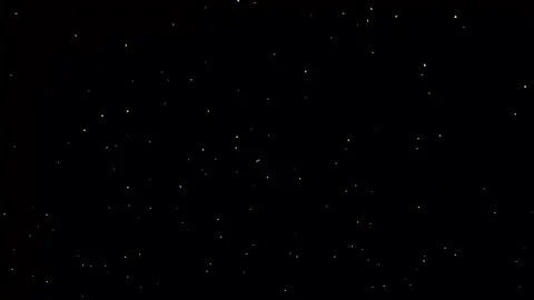 Glitter particles in slow motion falling Stock Footage 323343891