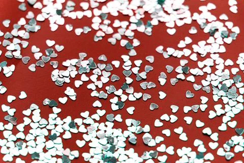 Glitter on red background Stock Photos