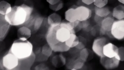 Glitter sequins light leak overlay in black and white, vintage classic film Stock Footage 296628678
