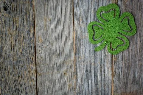 Glitter Shamrock on Rustic Wooden Background Stock Photos