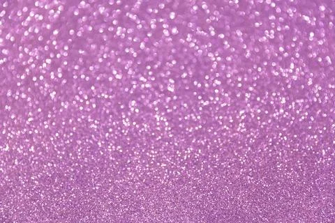Glitter sparkling purple bokeh background Stock Photos