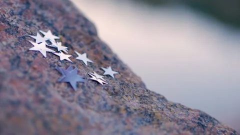 Glitter stars on a stone Stock Footage 104845267
