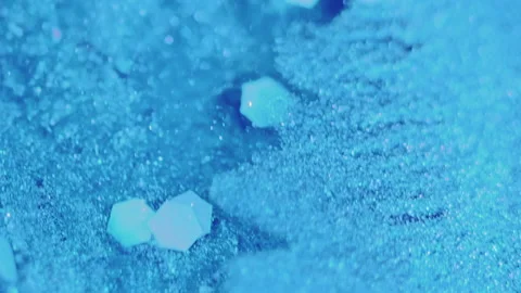 Glitter wave paint spill blue bronze ink water Stock Footage 276046603