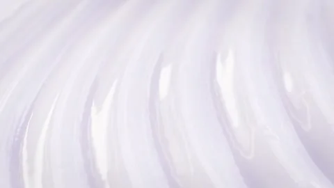 Glitter wavy texture from thick white shampoo 動画素材 258321288