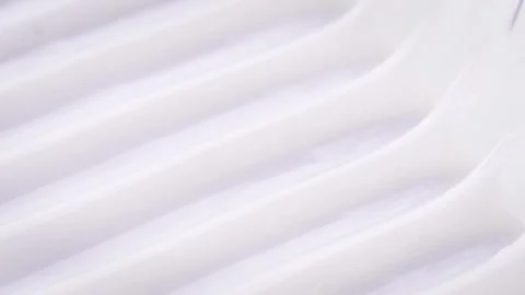 Glitter wavy texture from thick white shampoo 스톡 동영상 258321480