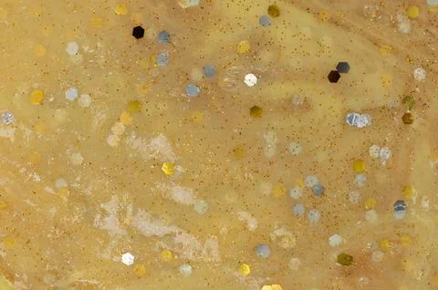 Glitter yellow slime surface Stock Photos