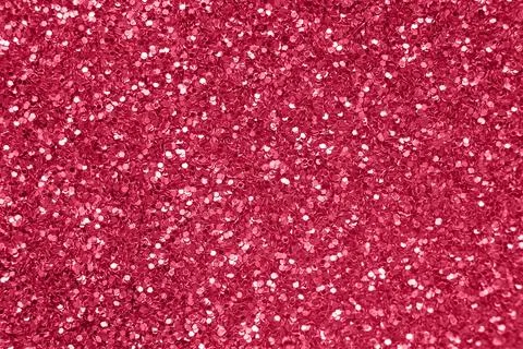 Glittering background of red sequins closeup. Sparkle festive texture Foto stock