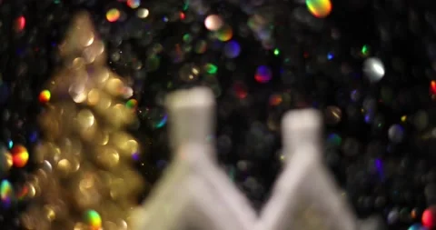 Glittering colored particles flying inside the new year glass ball.	 Video stock 168181279