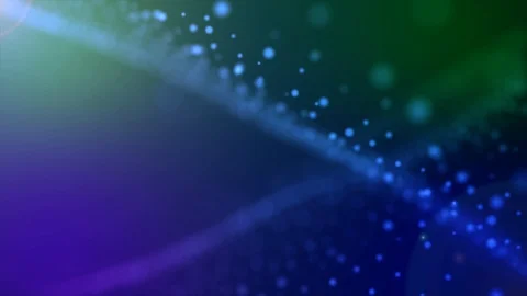 Glittering colorful small particle waves background. Amazing blue and green dust Stock Footage 100547485