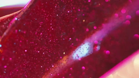 Glittering drip liquid sparkles crimson pink red Video stock 291763680