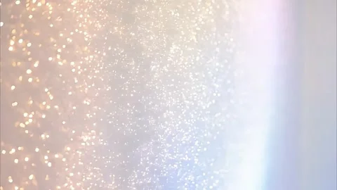 Glittering Dust: Particles Shimmer on a Gradient Backdrop Video stock 285748803