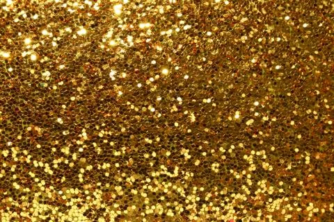 Glittering gold background Stock Photos