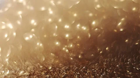 Glittering gold bokeh effect with a shifting focus, perfect for a Christmas Stock Footage 291891853