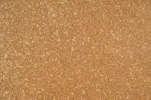 Glittering golden background Stock Photos