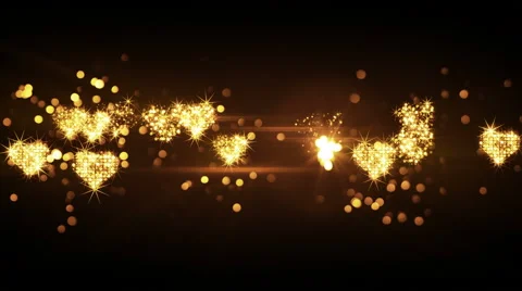 Glittering heart shapes from firework bursts loop 4k (4096x2304) Stock Footage 56293123