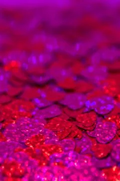 Glittering hearts background Stock Photos