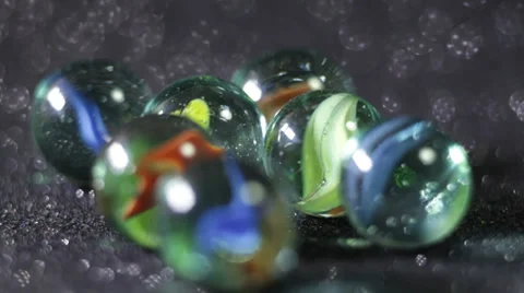 Glittering marble balls rolling 库存影片 31337677