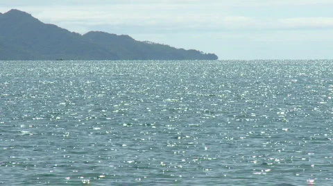 Glittering ocean surface in the sun reflecting like diamonds Stock Footage 609544