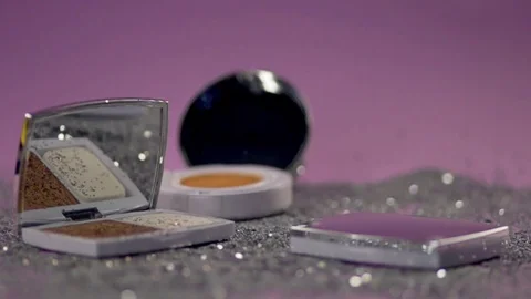 Glittering particles pour down from top to objects in a scene. Video stock 77512228
