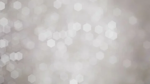 Glittering soft silver white bokeh background with flickering light particles. Stock Footage 105664098