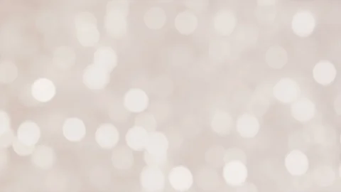 Glittering soft silver white bokeh background with flickering light particles. Stock Footage 105986268