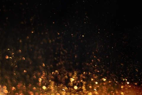 Glittering sparkles in dark Stock Illustration