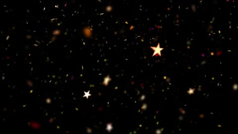 Glittering star particles float in black space Video stock 336591182