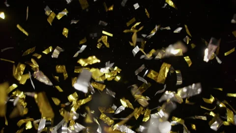 Glitters And Confetti Exploding On A Black Background 스톡 동영상 233460942