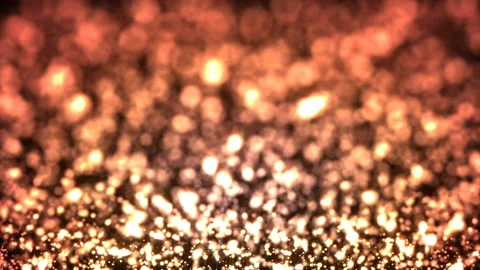 Glittery orange particles used as a background Vidéo 233758248