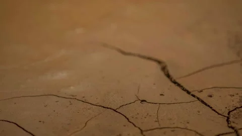Global climate change and drought. timelapse evaporation from soil. dry, cracked Stock Footage