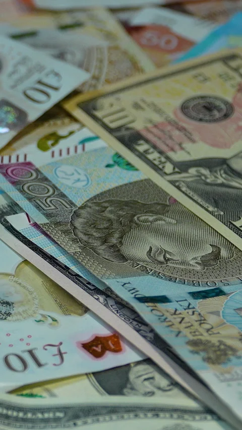 Global Currency Banknotes Pile With US Dollars Euro And Polish Zloty Stock Footage 339967469