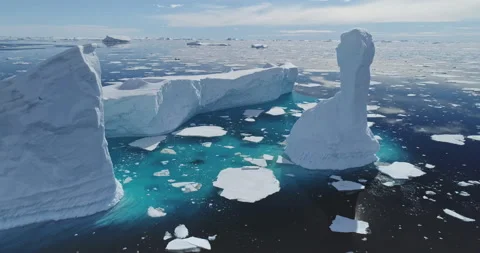 Global issue of climate change and melting icebergs on South Pole aerial Stock Footage