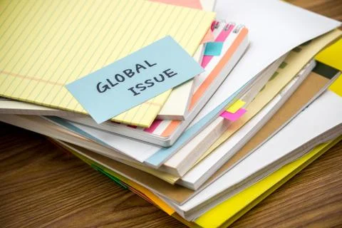 Global Issue; The Pile of Business Documents on the Desk Stock Photos