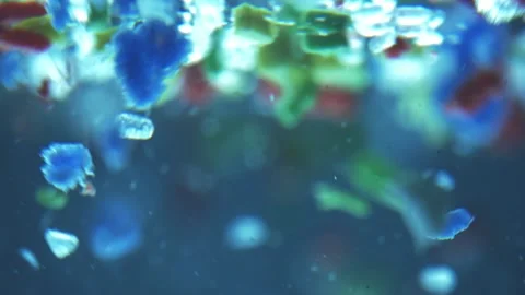 Global ocean pollution - microplastic in water. recycling concept plastic Stock Footage 153613554