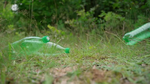 Global plastic pollution problem. Trash in forests and nature Stock Footage 158121195