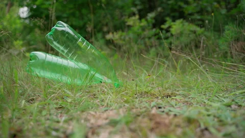 Global plastic pollution problem. Trash in forests and nature Stock Footage 158121777