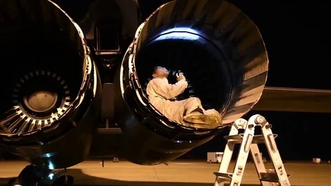 Global Thunder 18 Exercise - airman checking engine of B-1 Lancer using torch Video stock 82341483