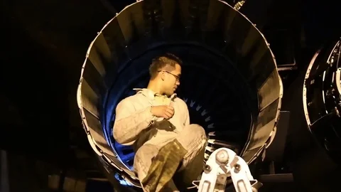 Global Thunder 18 Exercise - airman checking engine of B-1 Lancer with torch Video stock 82341506