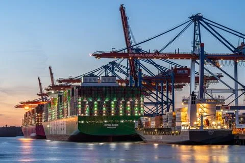 Global trade logistics, Containership on the harbor of Hamburg, Germany Stock Photos