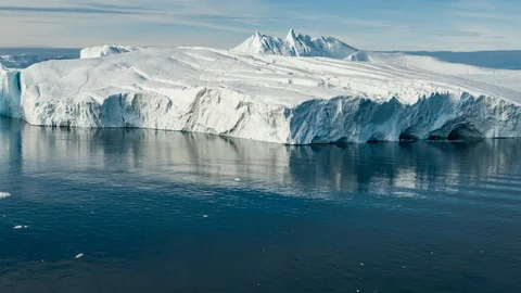 Global Warming and Climate Change - Icebergs from melting glacier on Greenland Stock Footage 101625838