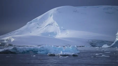 Global Warming and Climate Change with Melting Ice and Warming Ocean in Stock Footage 341375948