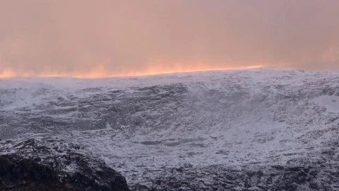 Global warming in the Arctic - sunlight warms snow blown by wind Stock Footage 70216763