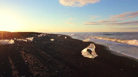 Global Warming Climate Change Concept. Icebergs on Black Sand Beach. Video stock 51849331