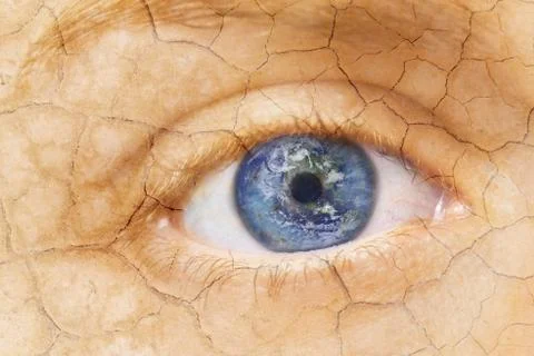 Global warming concept. Close up image of woman cracked textured face with iris Stock Photos