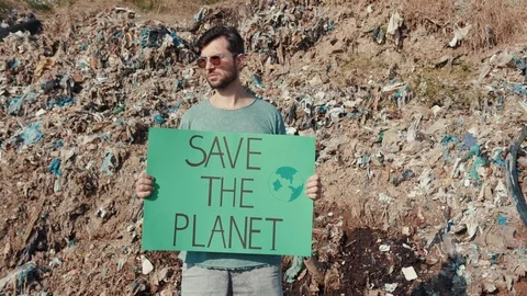 Global warming. Environment and pollution. Outdoor portrait of man activist Video stock 113819514